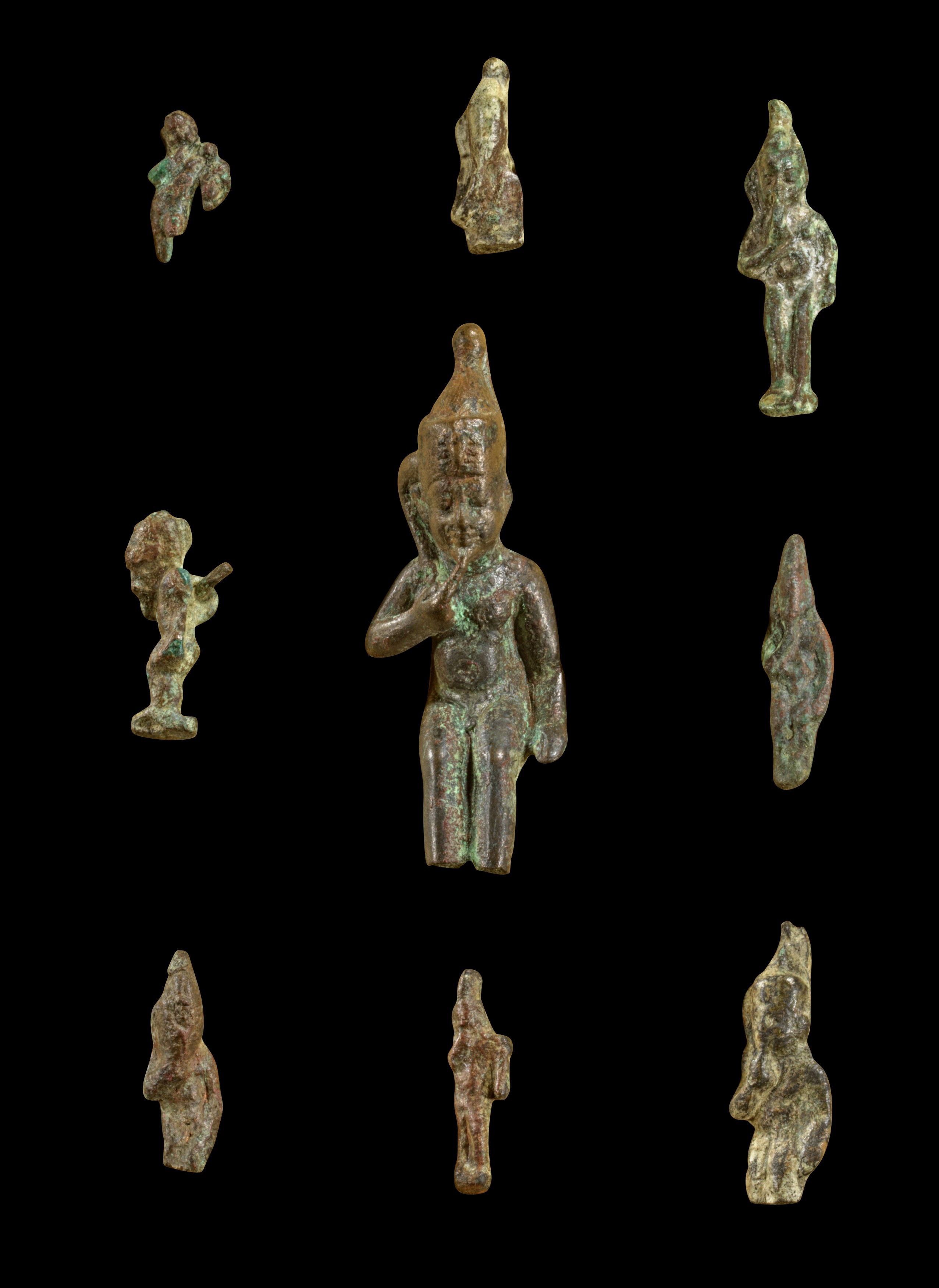 Collection of bronze statuettes of Harpocrates.