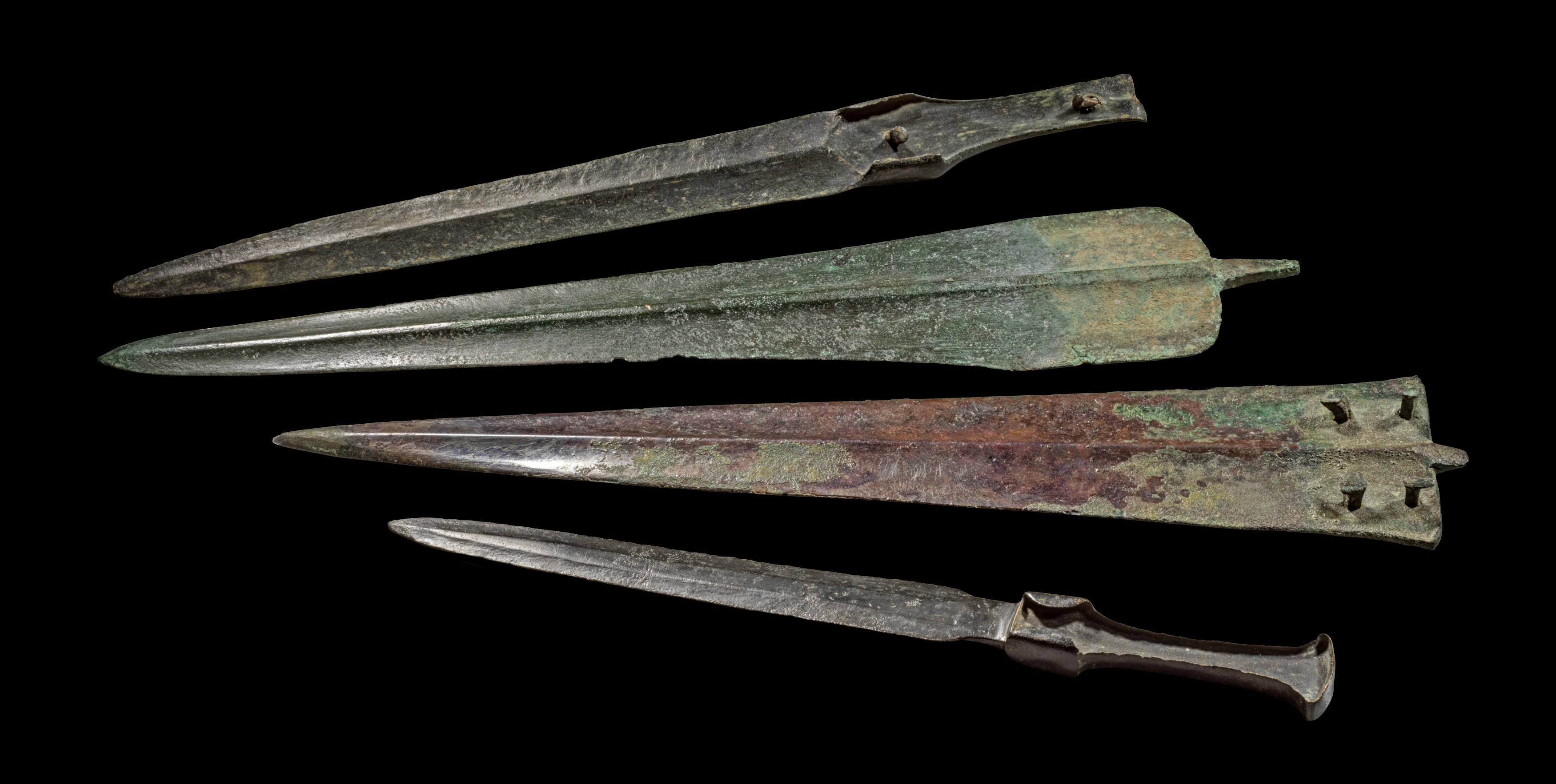 Three Western Asiatic bronze daggers, Canaan, Amlash and Luristan.