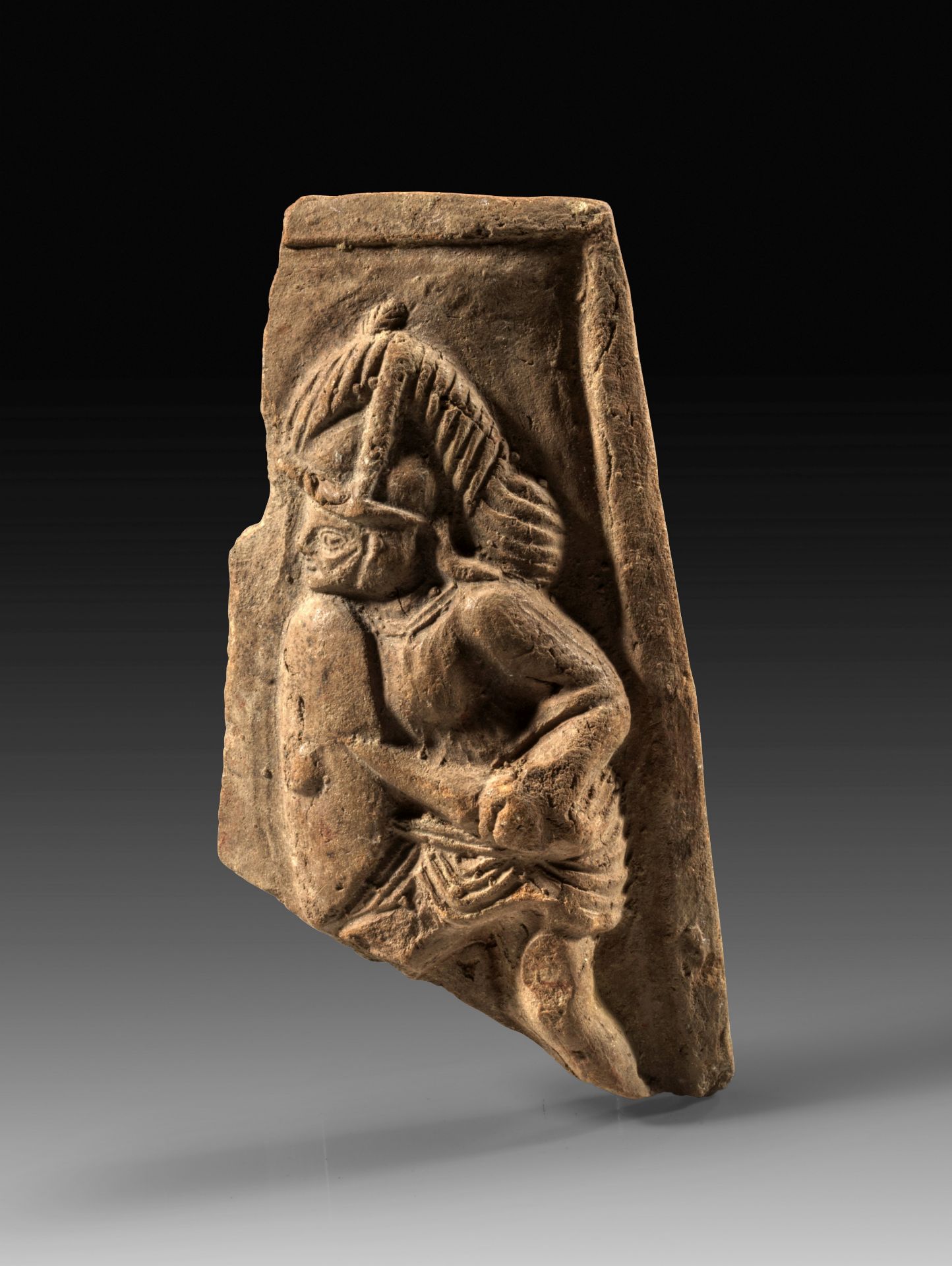 Fragment of a relief with gladiator of the type provocator. 