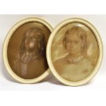 VICTORIAN SCHOOL Pair of oval portraits of girls Pastel on paper 47cm x 38cm Condition Report :