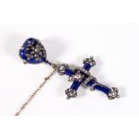 A MID VICTORIAN ROSE CUT DIAMOND AND BLUE ENAMELLED SERPENT, CROSS AND HEART BROOCH The cross with a