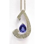AN 18CT GOLD TANZANITE PENDANT NECKLACE the pear shaped tanzanite in a white gold, diamond accented,