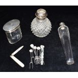 A SILVER TOPPED GLASS PERFUME BOTTLE Together with a silver topped glass vial and jar and a Mother