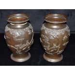 A PAIR OF BRONZE VASES OF BALUSTER FORM the rims with Greek key decoration, relief moulded