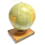 A 1961 PHILIPS CHALLENGE 13.5' TERRESTRIAL GLOBE on mahogany stand housing a Philips record atlas,