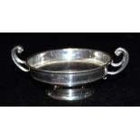 A SMALL SILVER TWIN HANDLED TROPHY engraved T.V.H., 1939, WORKMAN, the initials are for Tim Victor