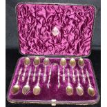 A CASED SET OF VICTORIAN SILVER APOSTLE SPOONS (12) and sugar tongs, spoons same design, maker CE,