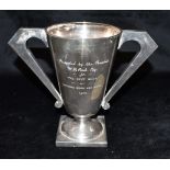 A TWO HANDLED SILVER TROPHY The trophy inscribed with details for the BEST BULL at October show