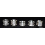 A COLLECTION OF SIX SILVER NAPKINS RINGS Weight 140 grams, 4.5 troy oz approx.