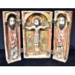 A CARVED WOODEN FOLDING TRIPTYCH ICON with gilded and polychrome painted decoration, 38cm high