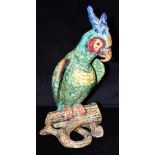 A LARGE FRENCH FAIENCE FIGURE OF A PARROT probably Fourmaintraux, naturalistically modelled with