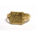 A VINTAGE 9CT GOLD SIGNET RING The bezel with cornered engraved pattern and monogrammed initial,