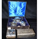 A SILVER SQUARE BOX together with a cased Millidge & Sons, silver plated bachelor tea for one