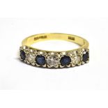 AN 18CT GOLD SAPPHIRE AND DIAMOND SEVEN STONE RING shank marked Birmingham 750, indistinct markers