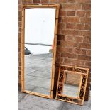 TWO VINTAGE BAMBOO FRAMED MIRRORS the larger 130cm x 53cm, the smaller 40cm x 53cm Condition