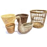 THREE WICKER WARE PAPER BASKETS, two planters and another planter in the form of a duck Condition