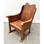 A SMALL ELM AND OAK FRAMED ARMCHAIR with leather upholstered seat Condition Report : good