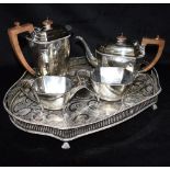 AN EDWARDIAN MAPPIN & WEBB SILVER TEA AND COFFEE FOUR PIECE SET together with a silver plated copper
