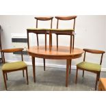 A GREAVES & THOMAS DINING TABLE AND FOUR CHAIRS the oval extending table with integral folding leaf,