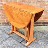 AN ERCOL BLONDE ELM AND BEECH DROP LEAF TABLE 84cm x 106cm with both leaves up Condition Report :