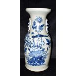 A LARGE CHINESE BALUSTER SHAPED VASE decorated with a scene of a bird on blossoming branch, relief