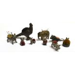 A COLLECTION OF VINTAGE PIN CUSHIONS Nine animal design pin cushions in metal