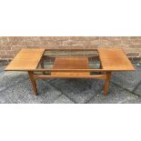 A G-PLAN TWO TIER TEAK COFFEE TABLE with glass inset top, 137cm x 51cm, 43cm high Condition Report :