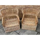 A PAIR OF LARGE WICKER CONSERVATORY ARMCHAIRS 88cm wide at widest point, 85cm high Condition