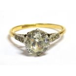 A VINTAGE 18CT PLATINUM AND WHITE SAPPHIRE RING ring marked 18ct plat, the round cut solitaire
