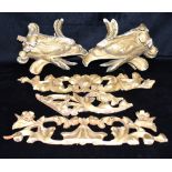 A PAIR OF GILT GESSO EAGLES HEAD MOULDINGS approx 27cm long, together with sections three gilt gesso