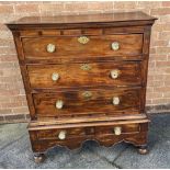 A MAHOGANY CHEST ON STAND the upper section with three drawers, the base with pair of drawers shaped