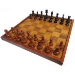 A STAUNTON PATTERN BOXWOOD & EBONY WEIGHTED CHESS SET the kings 9.5cm high; together with a