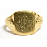 A VINTAGE 9CT GOLD SIGNET RING With the bezel engraved monogram faded hallmark to the shank, ring