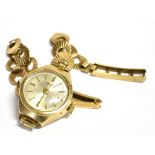 A LADIES 9CT GOLD BRACELET WATCH The open work circle strap marked 9.375 Birmingham 1972, weight