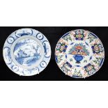 AN 18TH CENTURY DUTCH DELFT PLATE polychrome enamelled in the 'peacock' pattern, 23cm diameter;