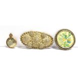 THREE ITEMS OF EARLY 20TH CENTURY JEWELLERY Comprising a gilt mounted reverse photo pendant fob (one