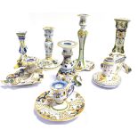EIGHT VARIOUS FRENCH FAIENCE CANDLESTICKS AND CHAMBER STICKS the tallest 23cm high
