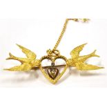 A LATE VICTORIAN 15CT GOLD DIAMOND SET SWALLOW AND HEARTS BROOCH the pin brooch with a swooping