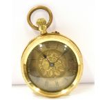 AN 18CT GOLD OPEN FACED POCKET WATCH With a silver gilt dial and rear case in foliate scroll and