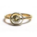 A SOLITAIRE DIAMOND RING The round cut diamond measuring 4mm in diameter in rub over setting with an