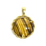 A 9CT GOLD MOUNTED TIGERS EYE PENDANT PIECE CIRCA 1970'S, THECIRCULAR Tigers eye measuring approx.