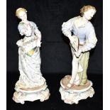 A LARGE PAIR OF CONTINENTAL HARD PASTE FIGURES the gentleman standing with mandolin, his female