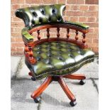 A GREEN LEATHER BUTTON UPHOLSTERED REVOLVING OFFICE CHAIR on five prong base Condition Report : good