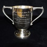 A SILVER TWO HANDLED TROPHY engraved for Cavendish Challenge Cup 100 yards Ladies Champions,