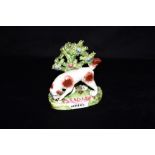 A VICTORIAN STAFFORDSHIRE PEARLWARE FIGURE ENTITLED 'SETTER' 13cm wide Condition Report : tail re-