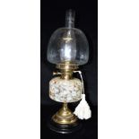 AN EDWARDIAN OIL LAMP with beehive shade, double Duplex burner and marbled glass reservoir, 57cm