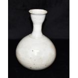 A POTTERY VASE OF GLOBULAR FORM with elingated neck, possibly Korean, 22.5cm high Condition Report :