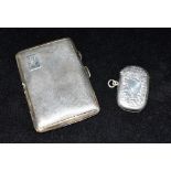 A SILVER CARD CASE TOGETHER WITH A SILVER VESTA CASE Of engine turned pattern with monogrammed