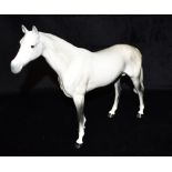 A LARGE BESWICK DAPPLE GREY HORSE stamped Beswick England to underside, 28cm high Condition Report :