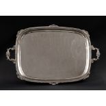 A LATE VICTORIAN SHEFFIELD SILVER PLATED TRAY The tray with two regency style handles and a raised